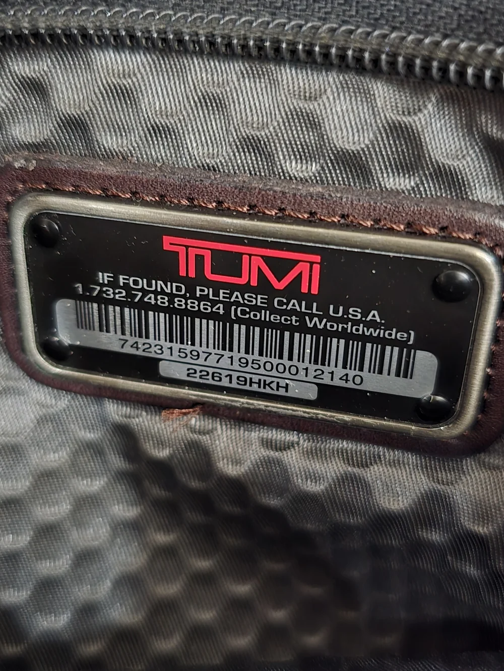 Tumi Black and Brown Travel Brief with Leather Trim